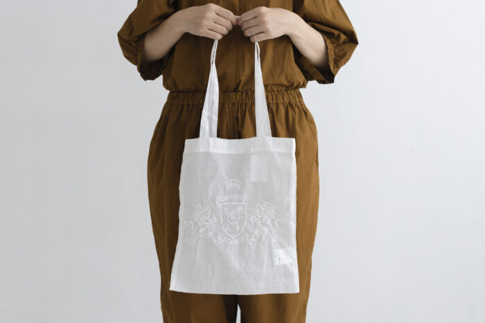 C.O LION EMBLEM PATTERN TOTE BAG 1