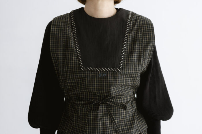 nolum apron block check black 1 nolum apron block check black 1